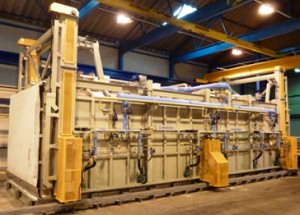 MOVING HOOD FURNACE